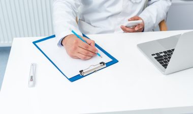 doctor with paperwork