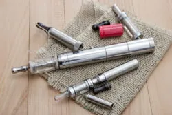 Parts of electronic cigarettes are displayed.