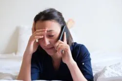 Frustrated woman on the phone