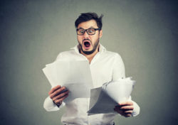 Man is shocked aqfter getting his statement containing bank overdraft fees.
