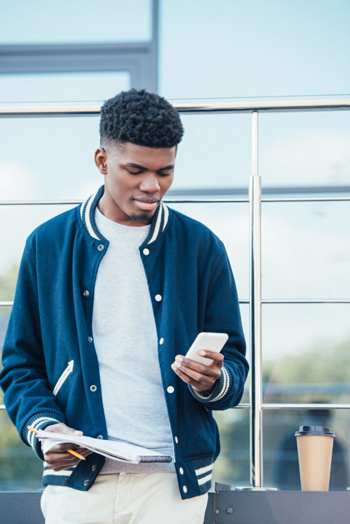 man getting unwanted phone call from PTZ insurance