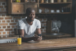 Man looking at text messge