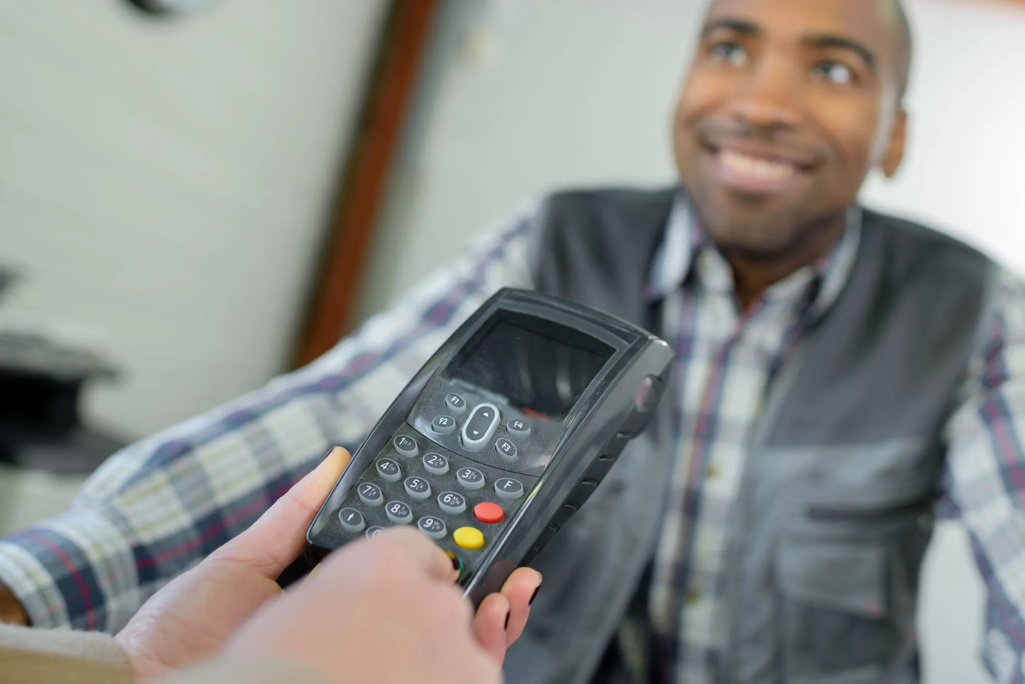 Man paying with credit card
