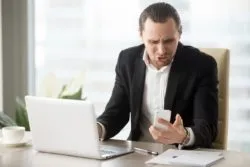 Man receiving unwanted spam phone call