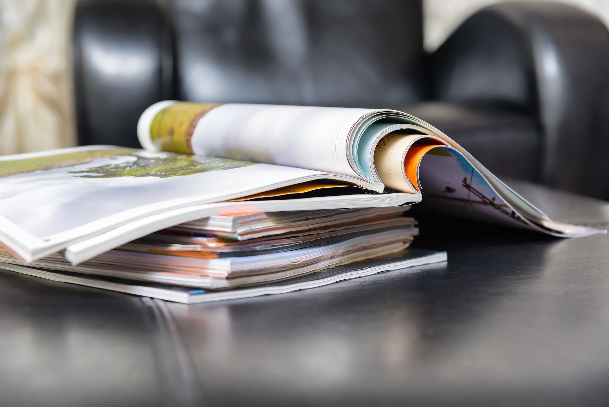 America's Test Kitchen magazines in a stack