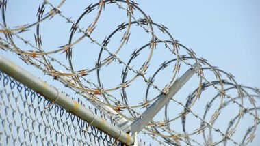 Razor wire at the top of a fence