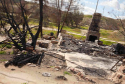 Remains of home burned by fire
