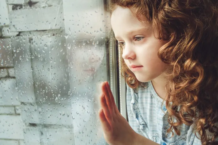 Indiana foster kid looking out the window
