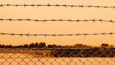 immigrant detainee facility fence