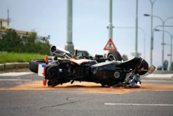 Totalled motorcycle on road