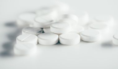 White pills on white