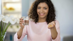 Woman taking supplements