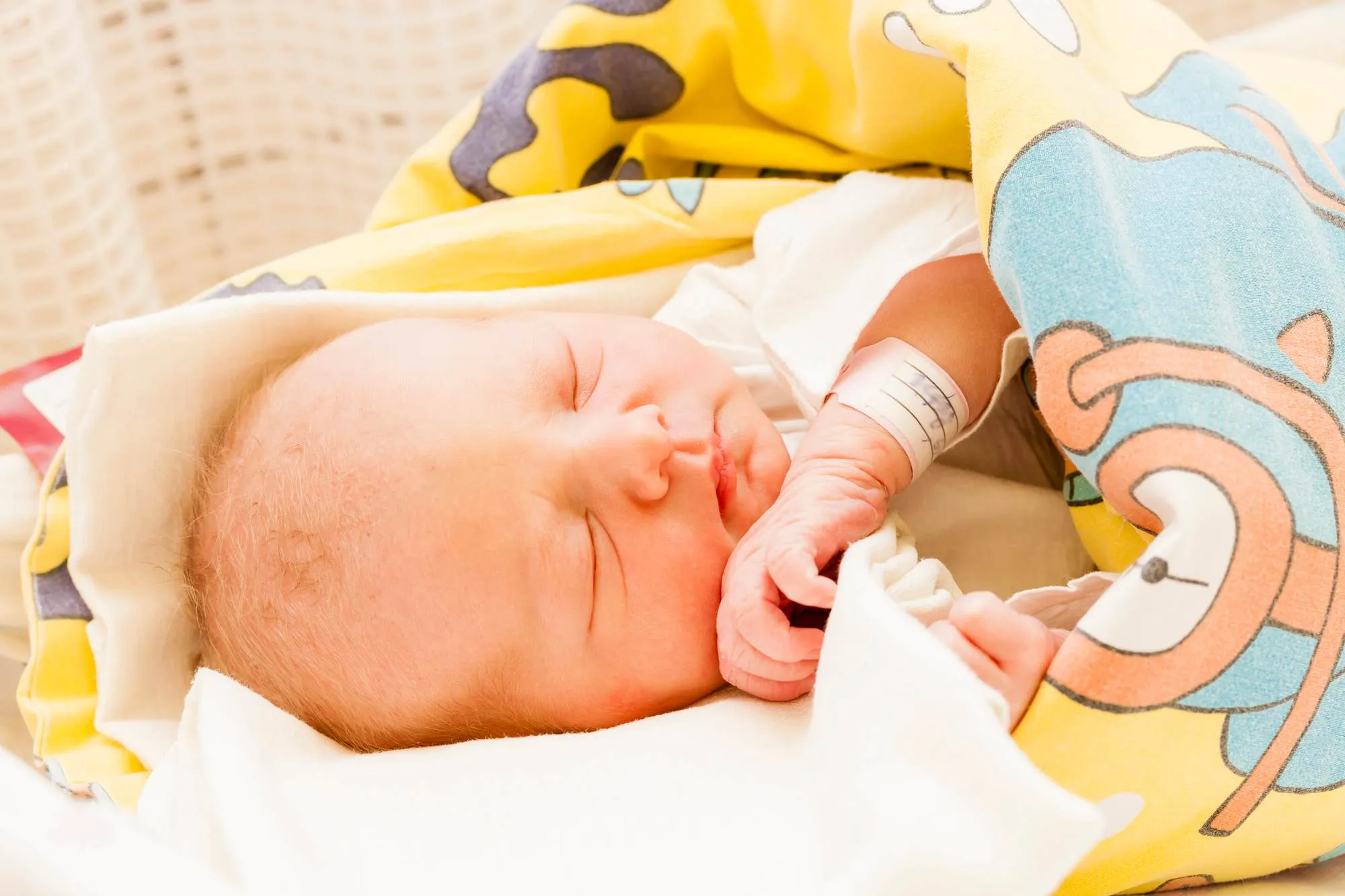 baby wrapped in blanket