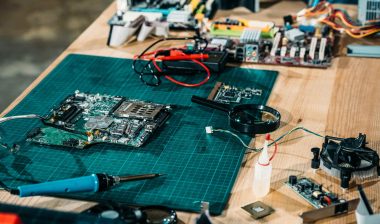Circuit board and tools on table