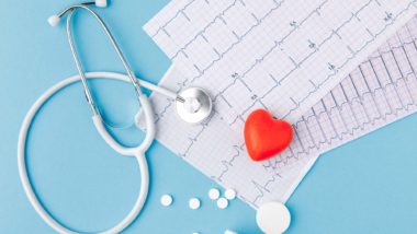 Cardiogram with heart and stethoscope