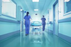 Nurse walking down a hall