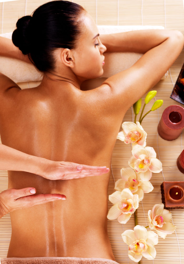woman getting a massage at massage envy