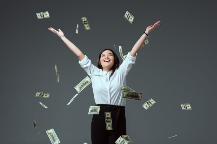 woman with settlement money from the Safeway grocery class action