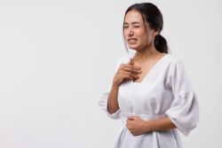 Woman with heartburn