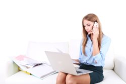woman on phone with debt collector