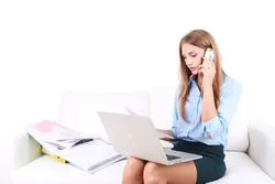 woman on phone with debt collector