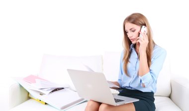 woman on phone with debt collector