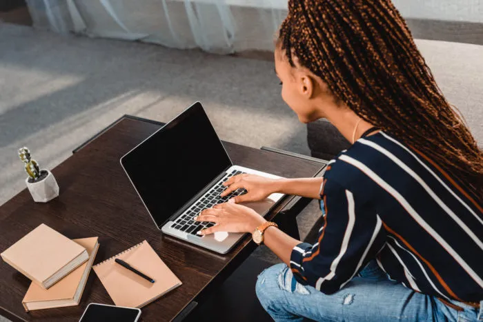 woman working on Asus laptop