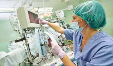 Surgery nurse working during operation
