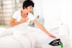 Woman having heart attack