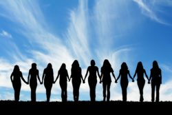 line of women holding hands