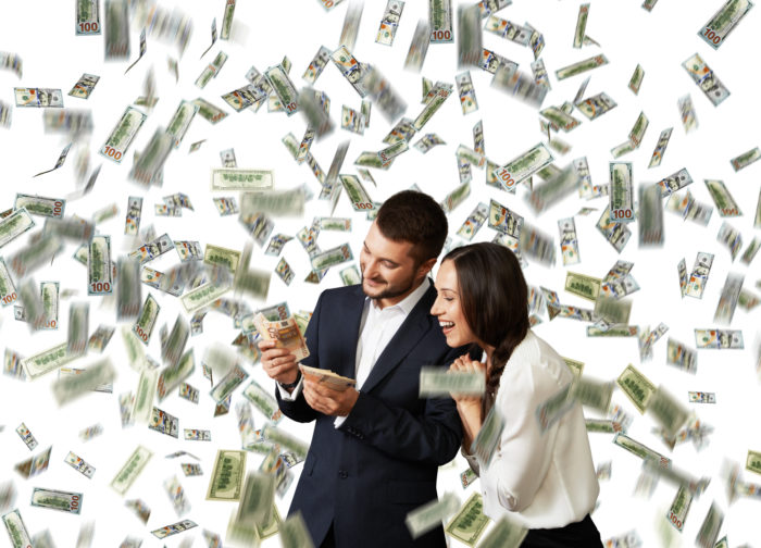 couple counting settlement check money