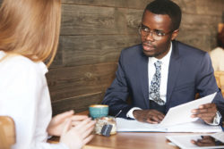 A man conducts a job interview.