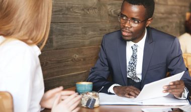 A man conducts a job interview.