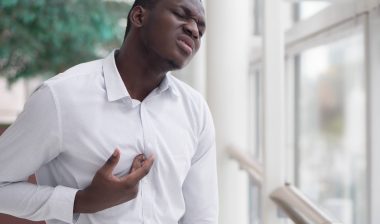 Man suffering from heartburn
