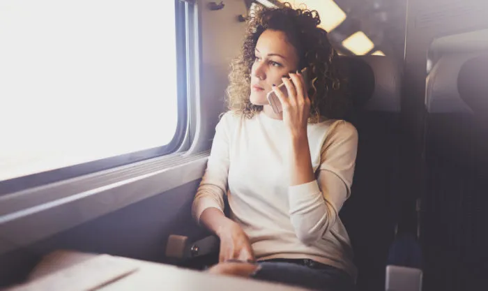 woman receiving unwanted phone call from enagic