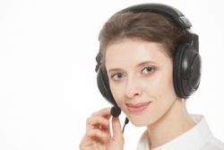 woman wearing phone headset at work