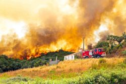 Huge forest fire threatens homes