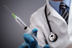doctor with shingles shot