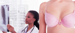 Doctor looking at x-ray woman's chest