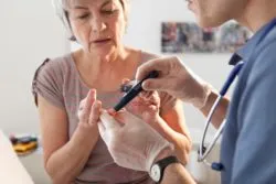 elderly woman diabetes test