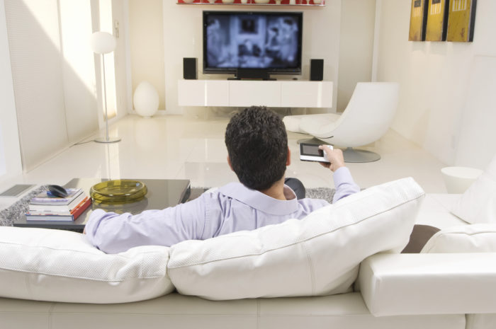 man watching comcast television
