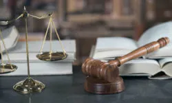 Scales of justice, gavel, law books