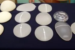 selection of breast implants on table