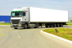 Drivers and helkpers agree to settle trucker overtime suit.