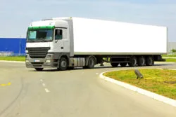 Drivers and helkpers agree to settle trucker overtime suit.