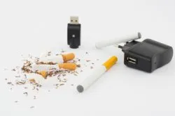 broken cigarettes and vape pen