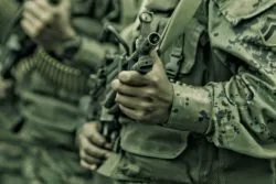 soldiers training with guns