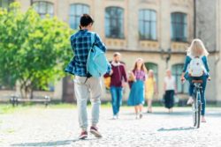community college students walking campus