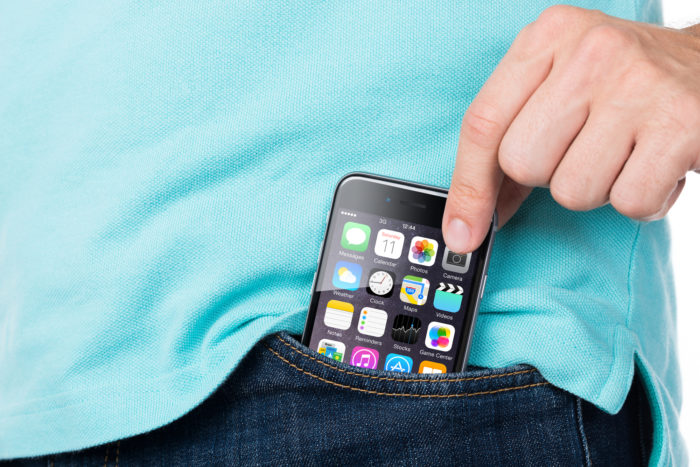 man holding apple iphone 6