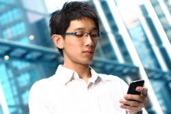 Man getting text message